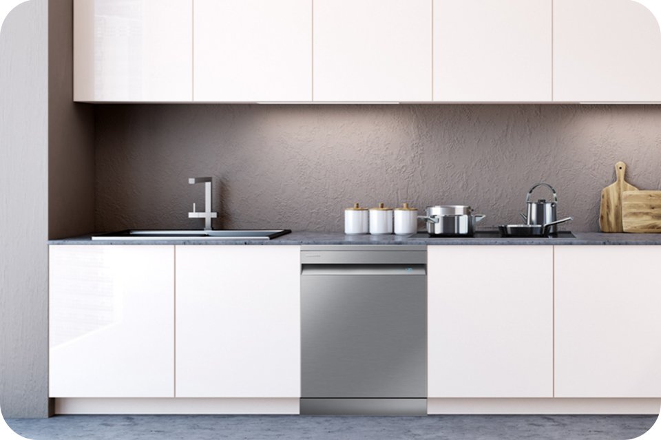 A silver Samsung dishwasher placed in a white modular kitchen.